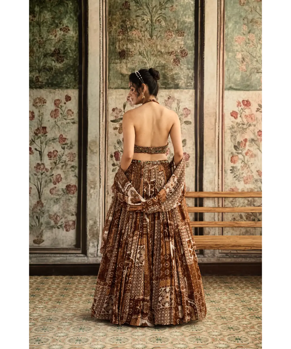 DIYARAJVVIR- Caramel Embroidered Halter Blouse with Printed Lehenga Set